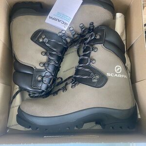 Brand new with tags. Scarps Fuegos fireproof boots. Great for prescribed burns.